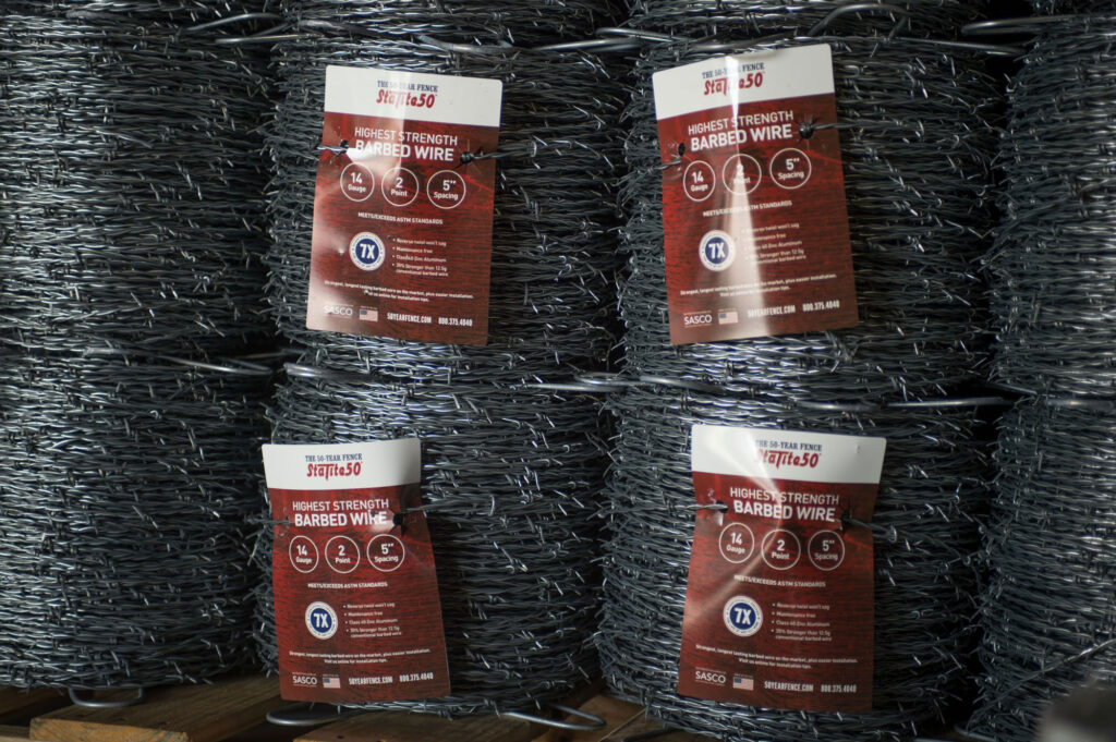 barbed-wire-50-year-fence-stacked-2 barbed-wire-50-year-fence-stacked